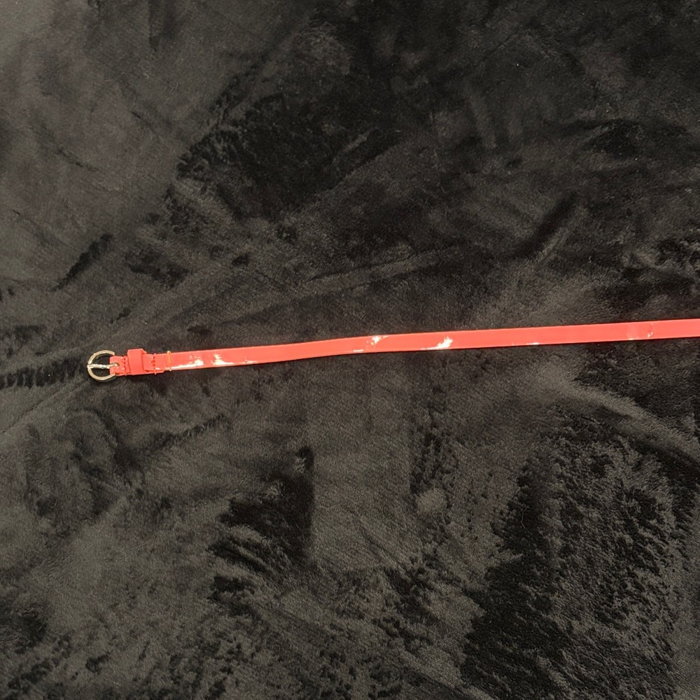 Hot pink belt with silver buckle
